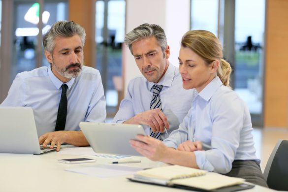 Technology advisory consultant reviewing business solutions with a client